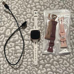 Fitbit versa 4 with White Band and Additional Straps